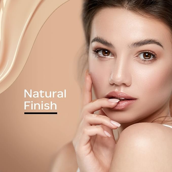 A sleek liquid concealer tube with its applicator wand pulled out, showing a creamy beige formula on the soft tip.